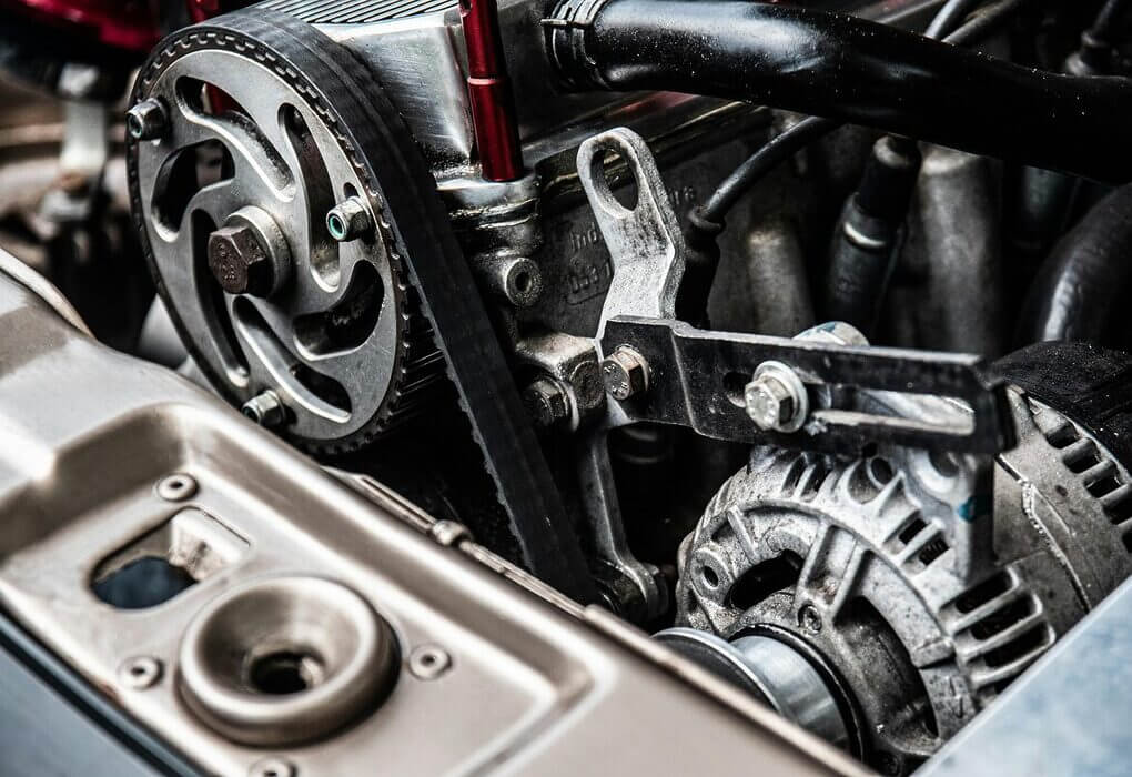 High-resolution close-up of a car engine showing intricate mechanical parts and metallic details.