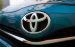 Yoshihiro Nakata représentant Toyota Motor Europe lors d’un événement automobile à Bruxelles