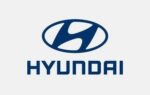 Le logo Hyundai visible sur la calandre d’un véhicule du constructeur sud-coréen.