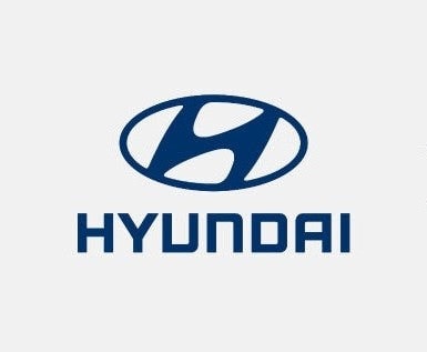 Le logo Hyundai visible sur la calandre d’un véhicule du constructeur sud-coréen.