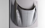 Un panneau de carrosserie Ferrari Sketch Body encadré et décoré de croquis automobiles.