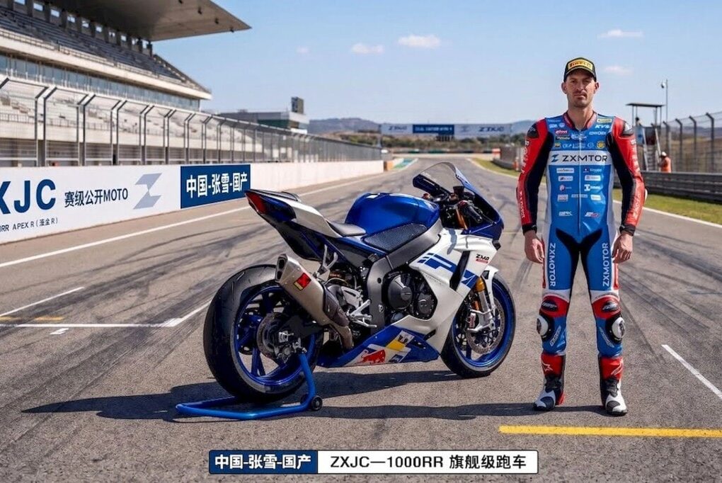 Une moto sportive ZXMoto engagée en compétition sur circuit.