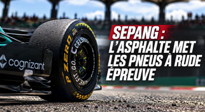 Une monoplace de Formule 1 roule sur le circuit de Sepang.